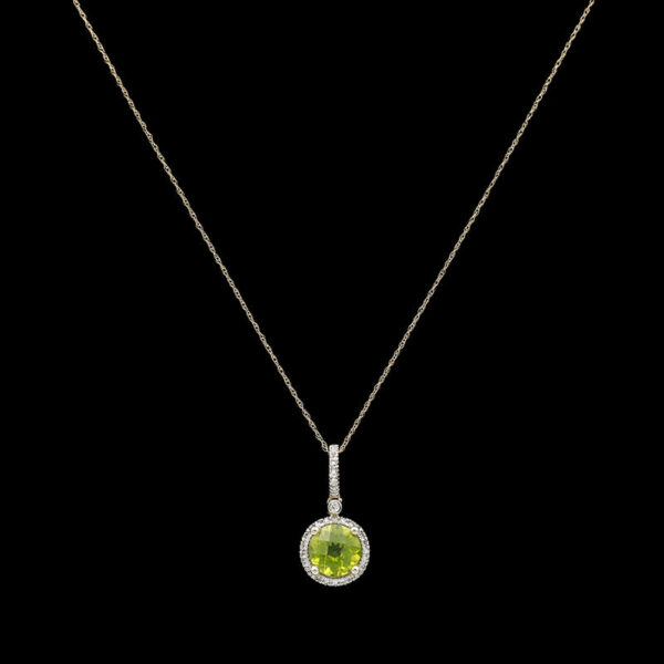 a necklace with a green stone and diamond