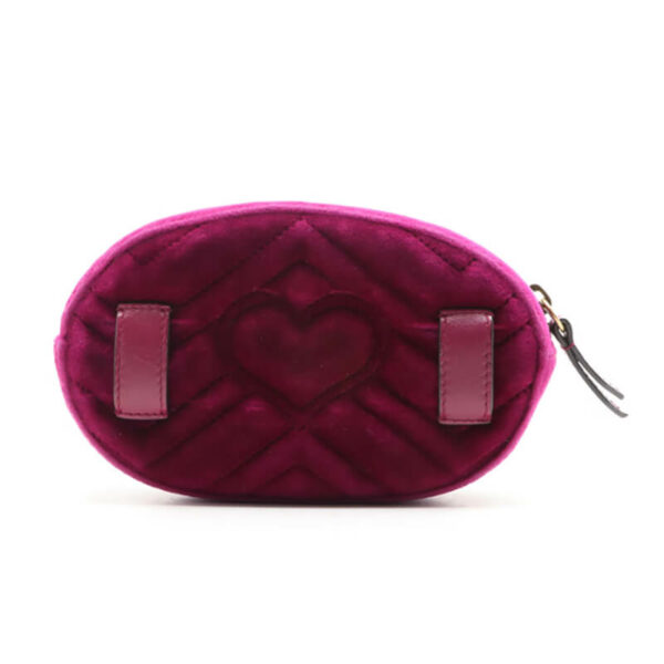 a pink purse with a heart on it