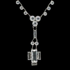 an art deco necklace with clear crystal stones