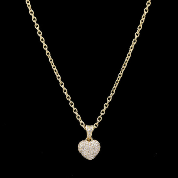 a necklace with a heart shaped pendant on it