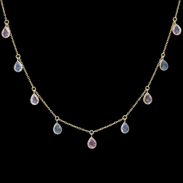 a gold necklace with pink and blue stones