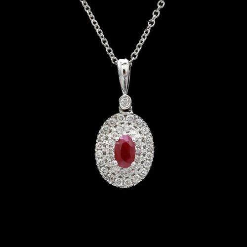 a red and white diamond pendant on a chain