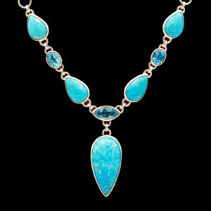 a necklace with blue stones on it