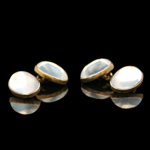two pairs of gold and mother of pearl cufflinks