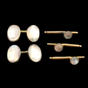 three pairs of gold and mother of pearl earrings