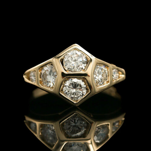a diamond ring with three diamonds on it