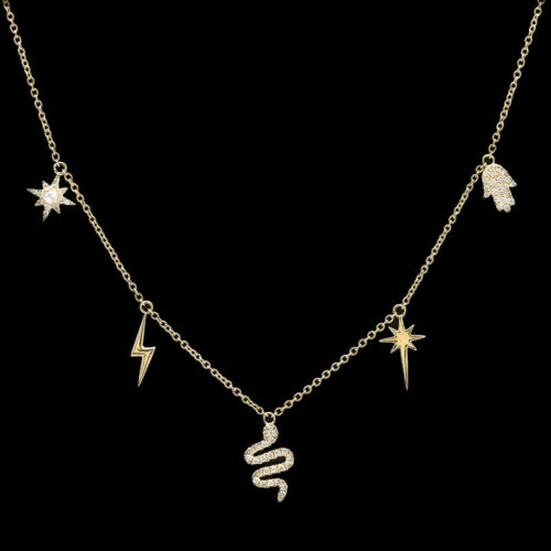 a gold necklace with stars and lightning charms