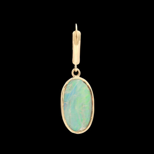 a pendant with a white opal in the center