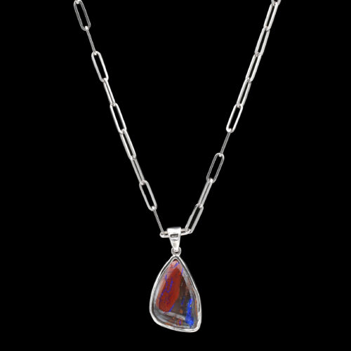 a necklace with a red and blue tear shaped pendant