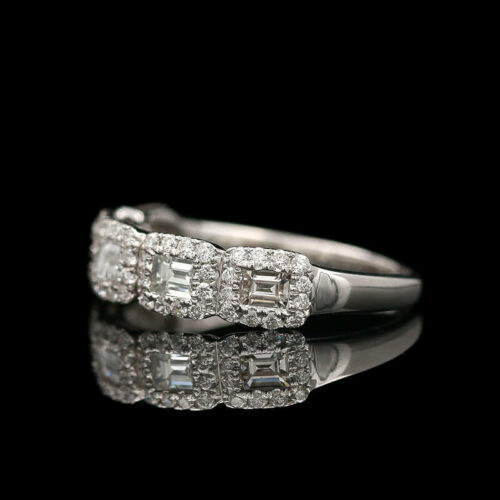 a diamond ring on a reflective surface