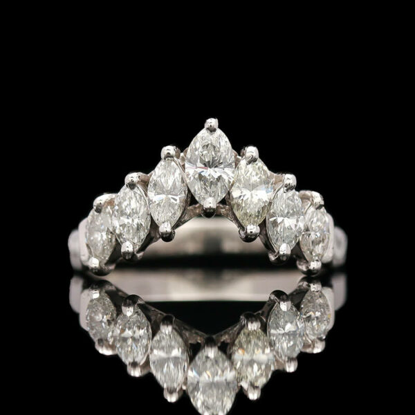 a diamond ring on a black background