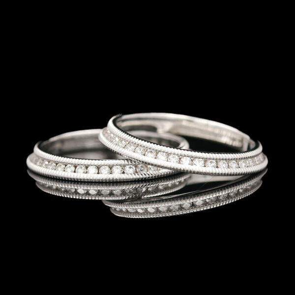 two white gold and diamond wedding bands