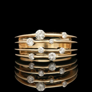 a stack of gold rings with diamonds