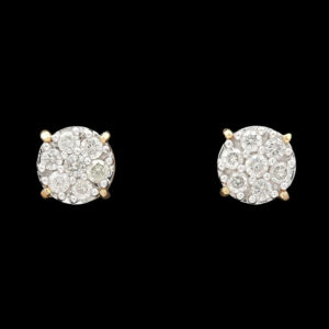 pair of diamond earrings on black background