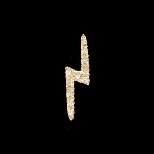 a gold and diamond letter brooch