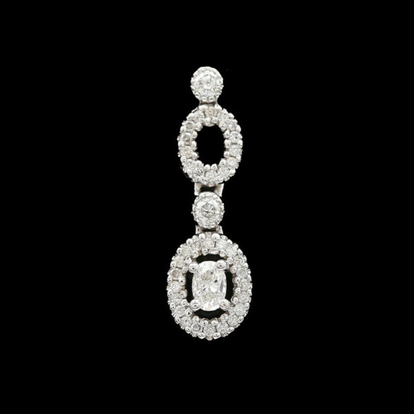 a diamond and white gold pendant