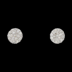 pair of diamond earrings on black background