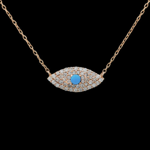 an evil eye necklace with diamonds and blue stones