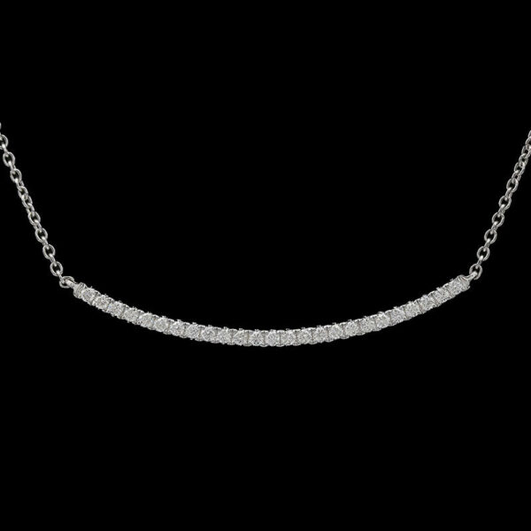 a diamond bar necklace on a black background