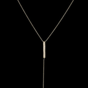 a long necklace with a bar on it
