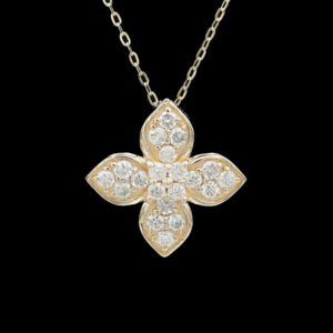a gold and diamond flower necklace