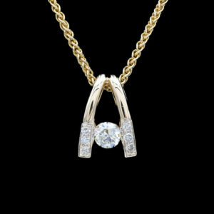 a diamond pendant with two diamonds on it