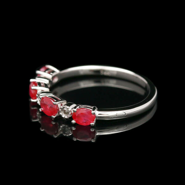 a close up of a ring on a black background