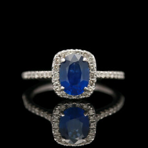 an oval shaped blue sapphire and diamond ring