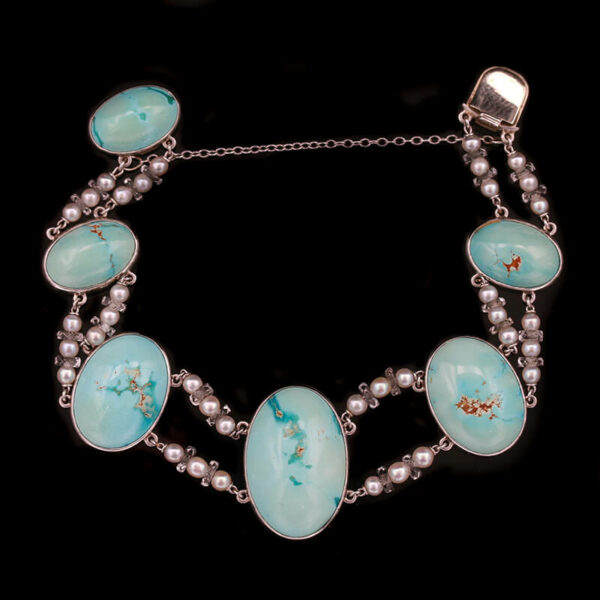 a bracelet with turquoise stones and pearls