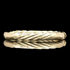 an 18k gold ring with twisted design