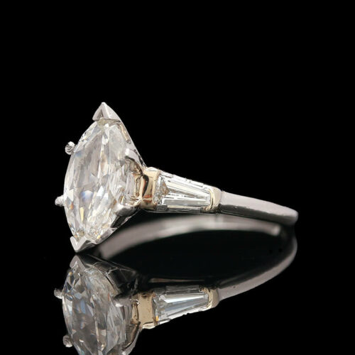 an old cut diamond ring with baguettes