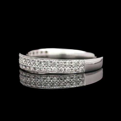 a wedding band with diamonds on it