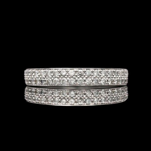 a wedding band with diamonds on it
