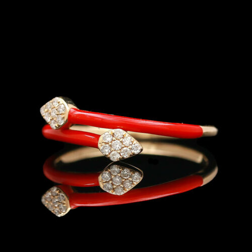 a pair of red and gold rings with diamonds