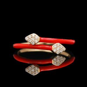 a pair of red and gold rings with diamonds