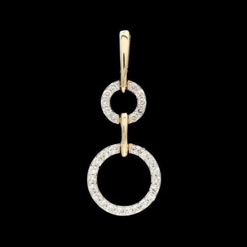 an 18k gold pendant with diamonds