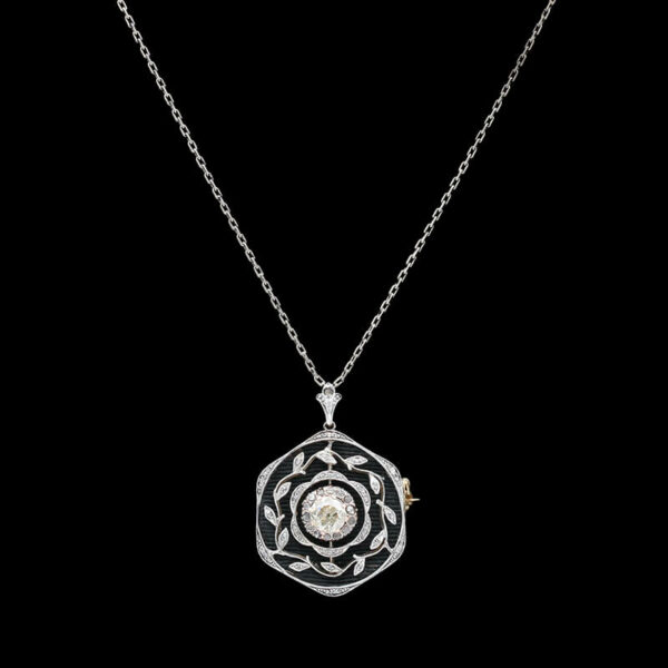 a necklace with a white diamond in the center