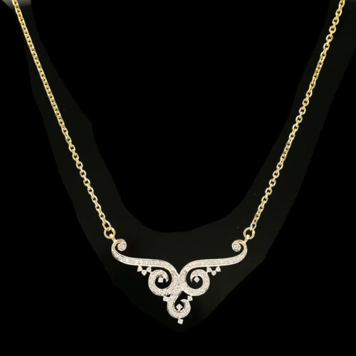 a gold necklace with white diamonds on it