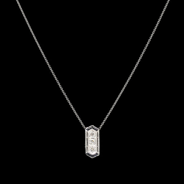 a necklace with a diamond pendant on it