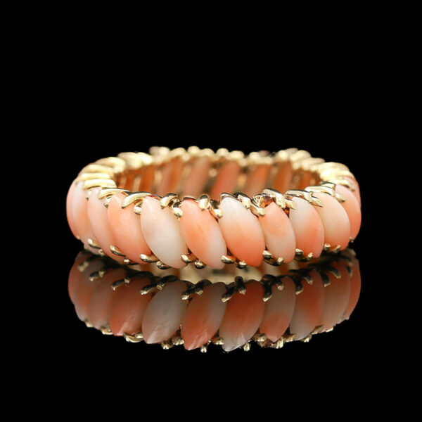 an orange and white ring on a black background