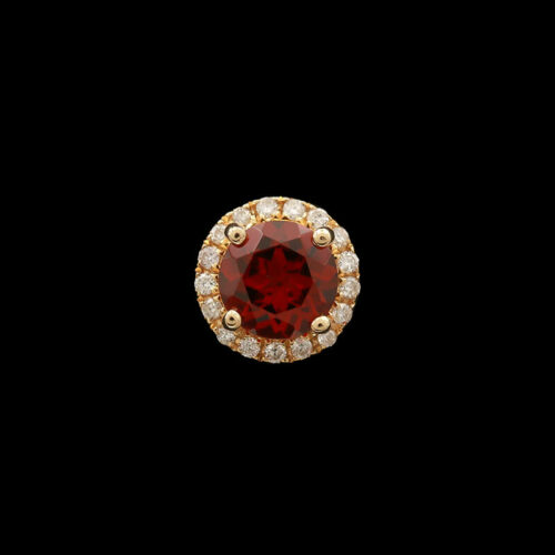 a red and white diamond ring on a black background