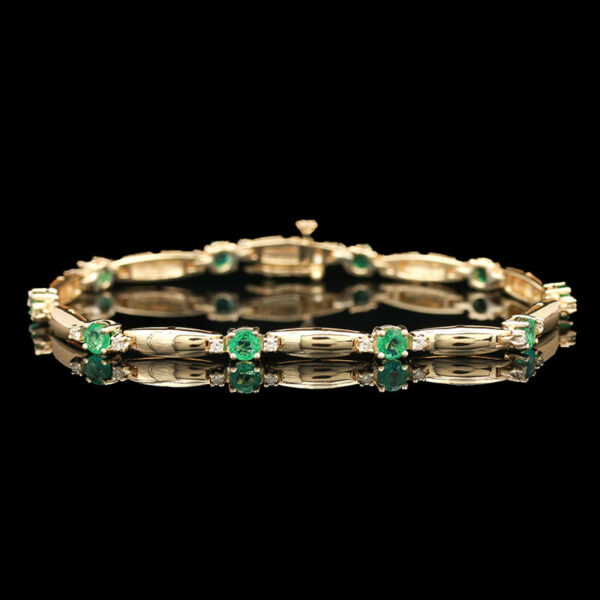 an emerald and diamond bracelet