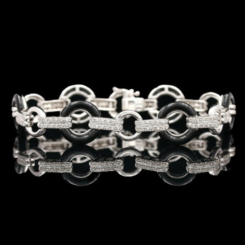 a black and white bracelet with silver links
