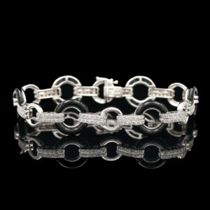 a silver bracelet with links and diamonds