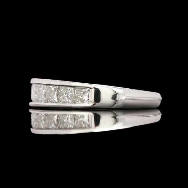 a pair of white gold and diamond rings