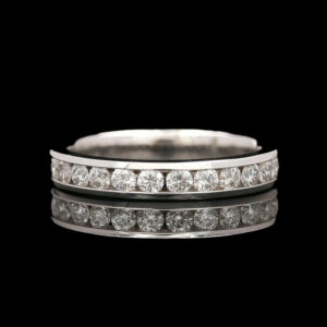 a wedding ring with diamonds on it