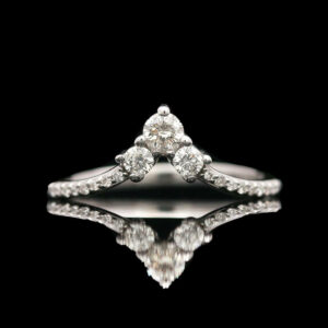 a diamond ring with three diamonds on it