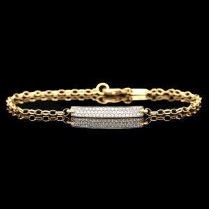 a yellow gold bracelet with diamonds