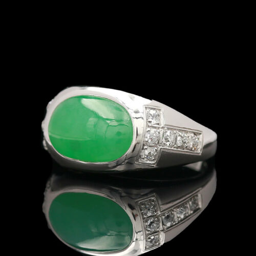 a green jade and diamond ring