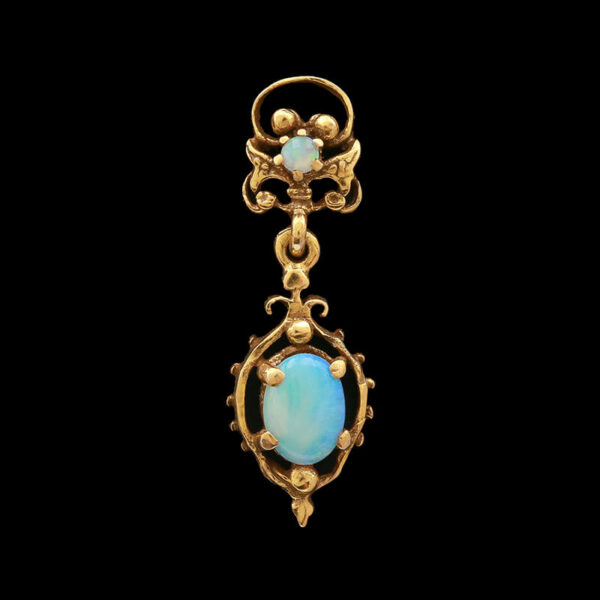 an opalite and gold broochle